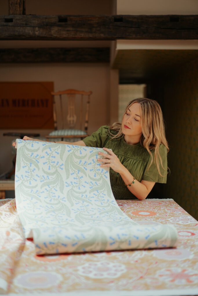 Ellen Merchant with her wallpaper