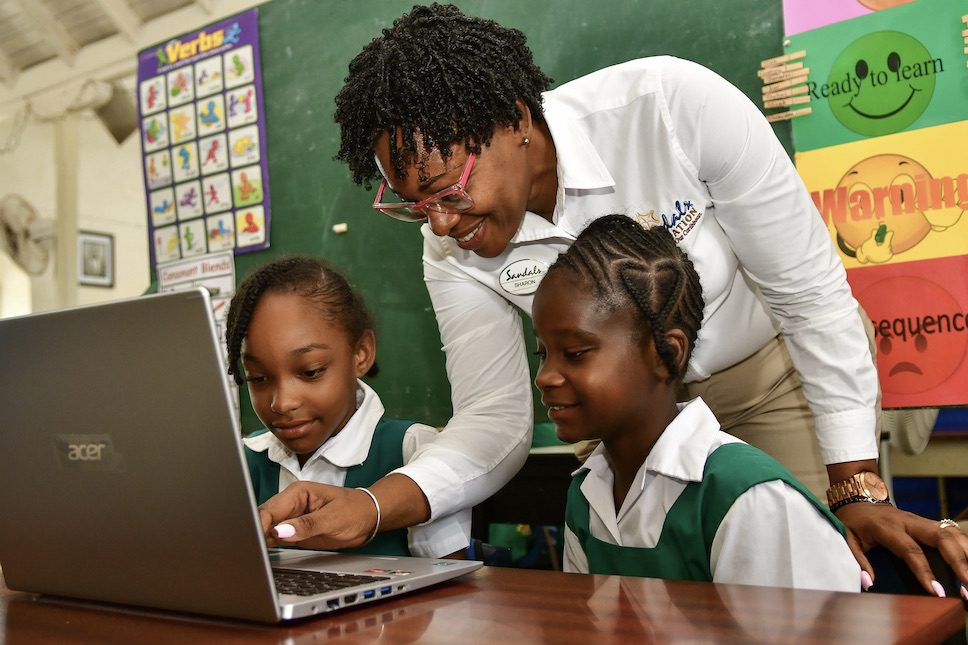 The Sandals Foundation deliver laptops to local schools